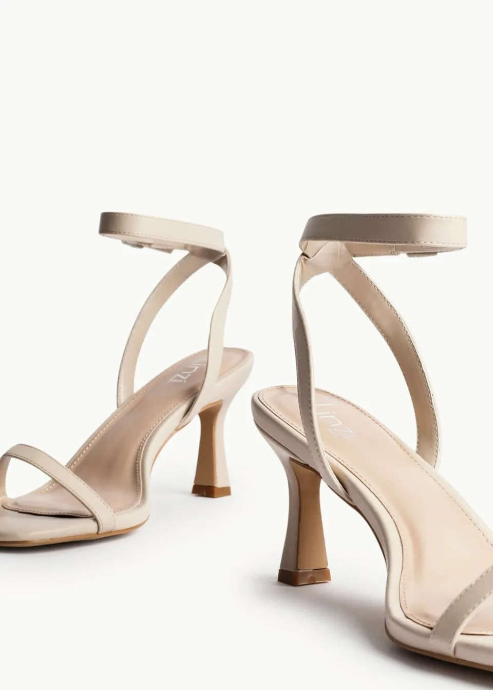 Footwear>Linzi Elevate Sand Faux Leather Barely There Stiletto Heeled Sandals
