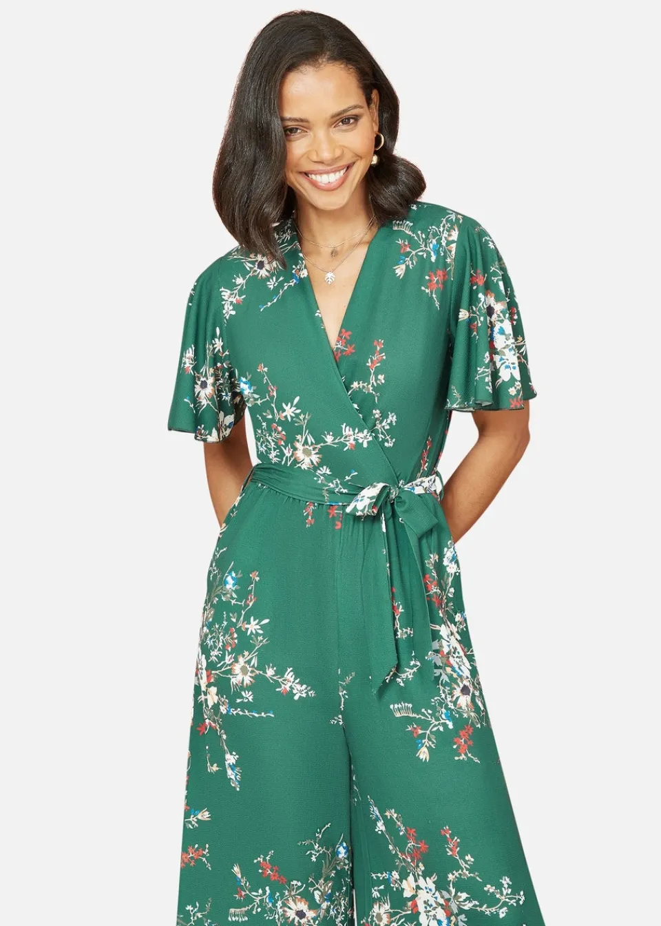 Jumpsuits & Playsuits>Mela Green Floral Print Jumpsuit With Angel Sleeves