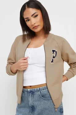 Coats & Jackets>PIXIEGIRL Petite Stone Brown Embroidered Initial Jersey Bomber Jacket