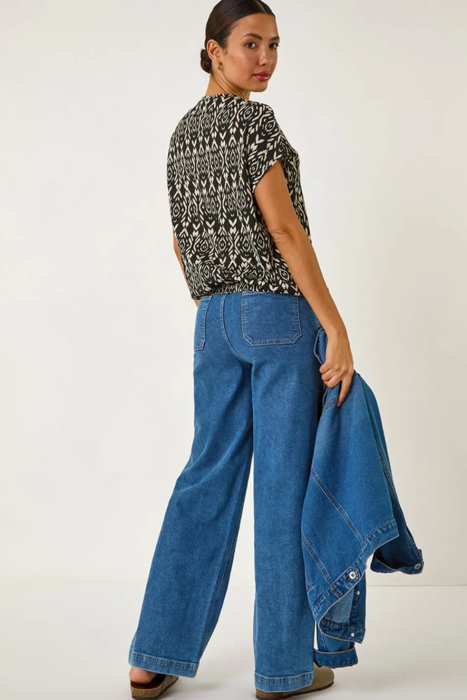 Tops>Roman Black Geometric Ikat Print Bubble Hem Top