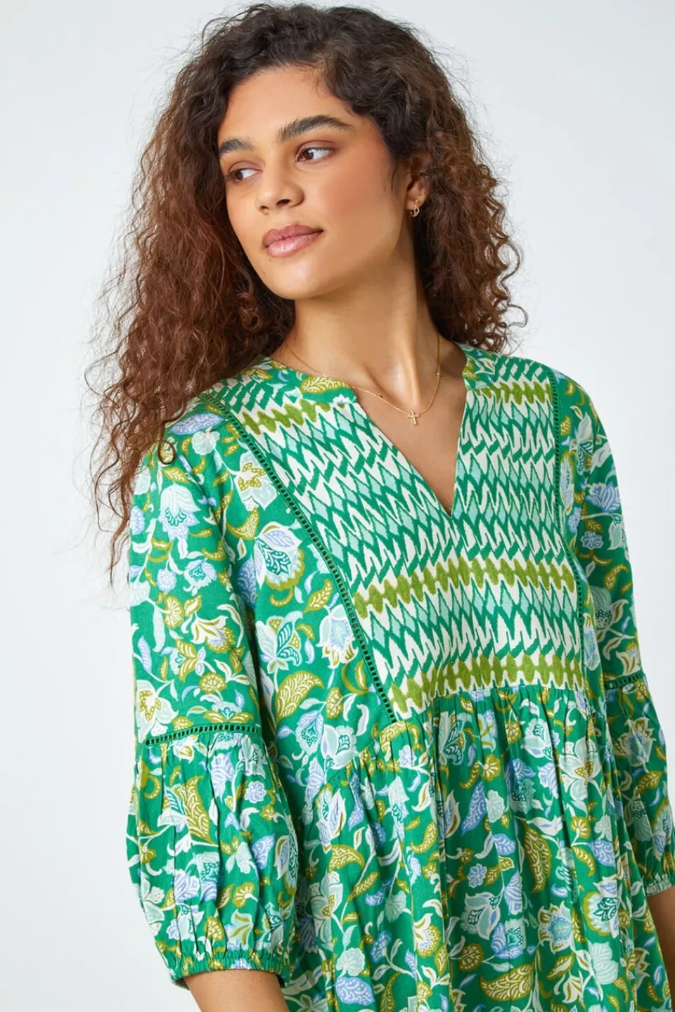 Tops>Roman Green Cotton Abstract Floral V-Neck Ladder Trim Top