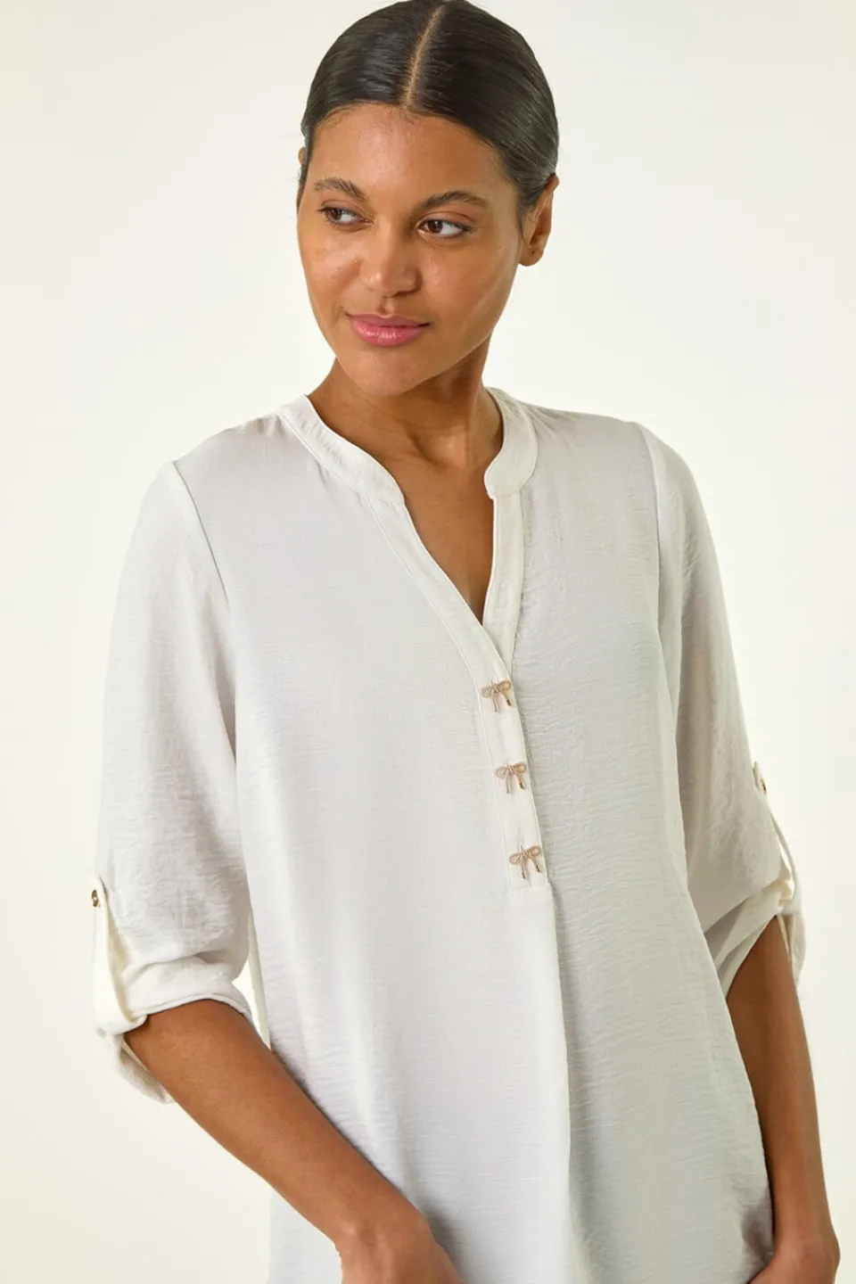 Tops>Roman Ivory Longline Bow Button Top